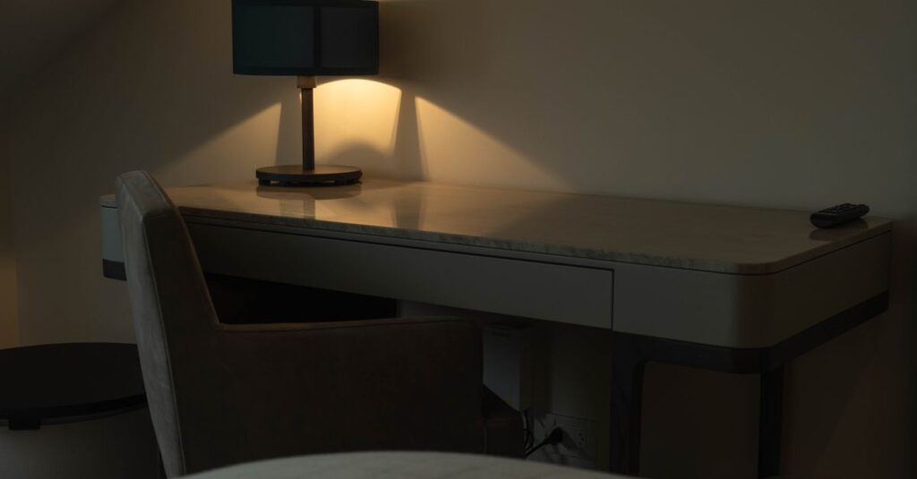 quiet evening desk soft light tired calm atmosphere