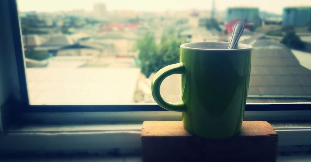 warm drink window light quiet peaceful morning calm