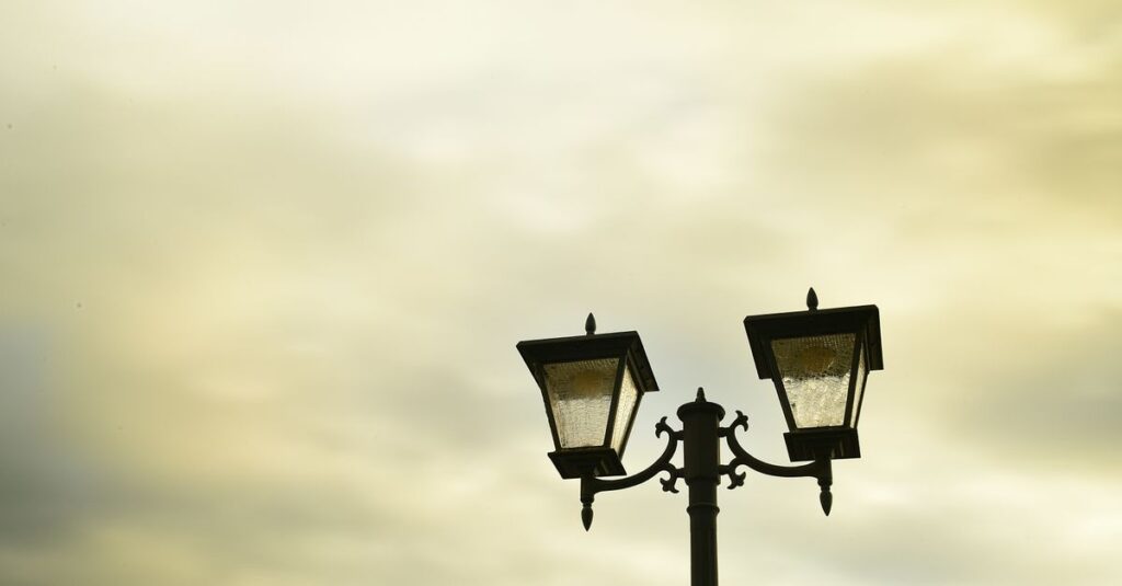 two soft lights in quiet dusk gentle connection