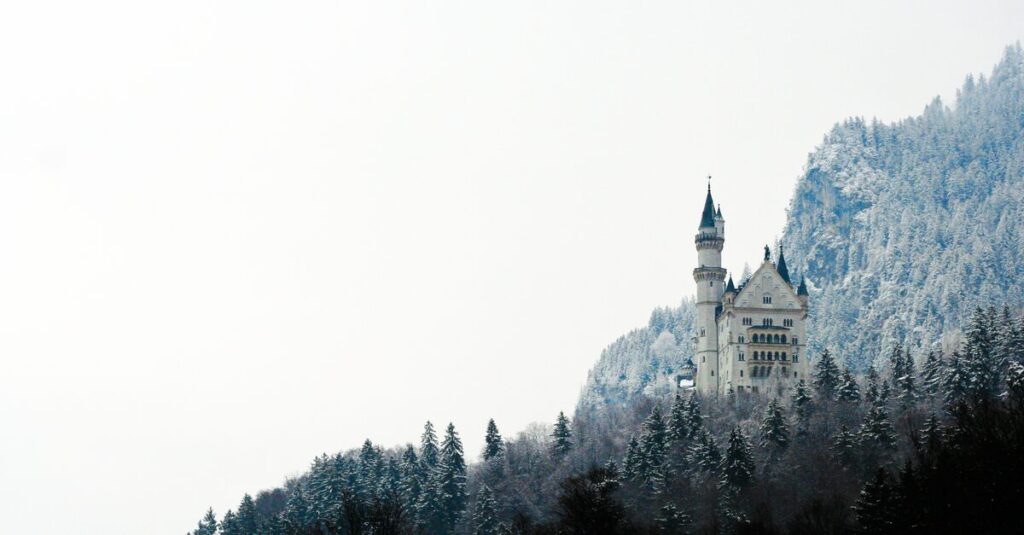 quiet snow mountains high tower mysterious witch magic library soft evening light