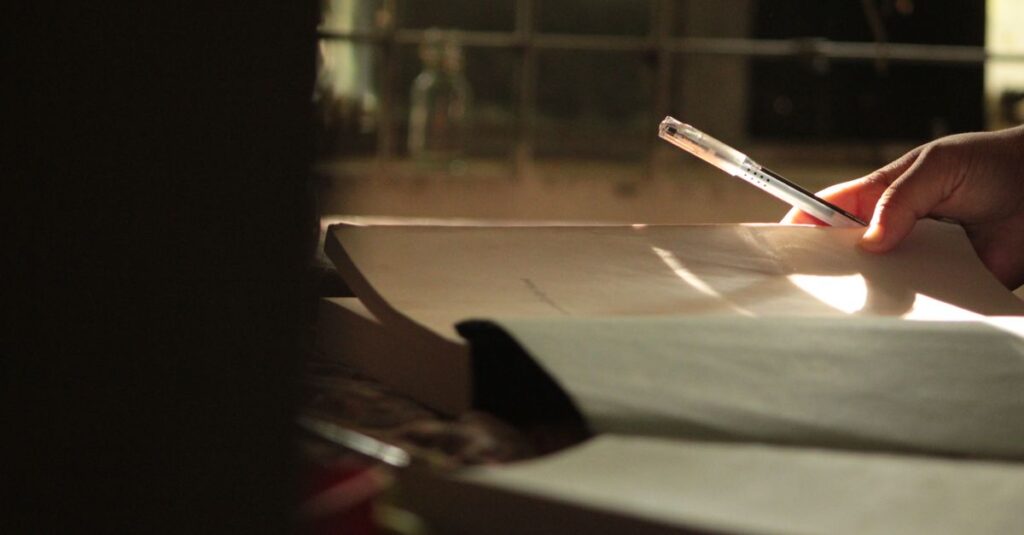 soft notebook by window gentle light quiet self reflection