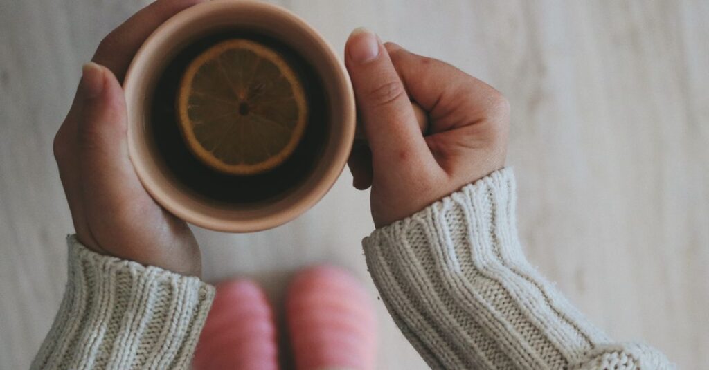 soft hands warm tea gentle silence peaceful atmosphere