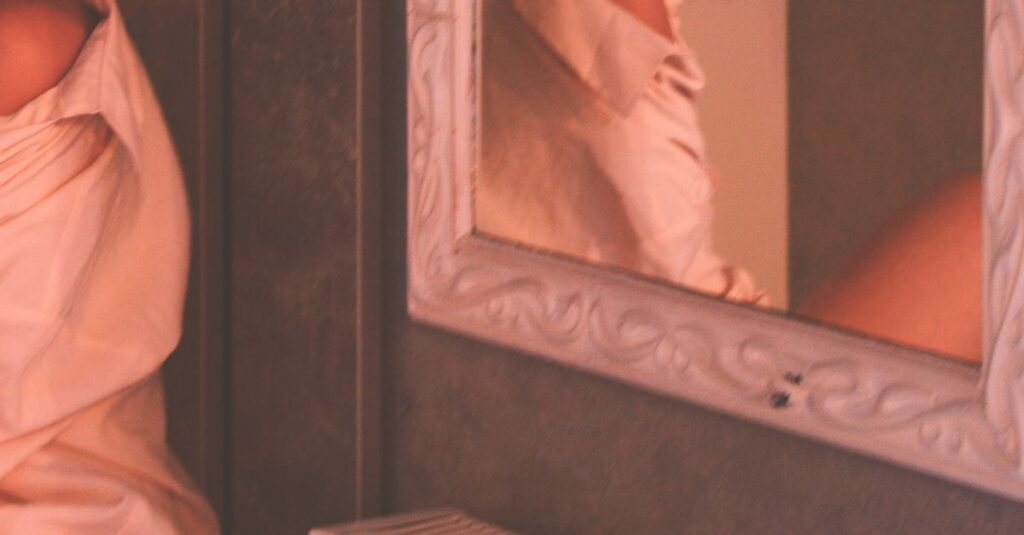 woman sitting quietly alone soft light failure disappointment gentle calm self reflection