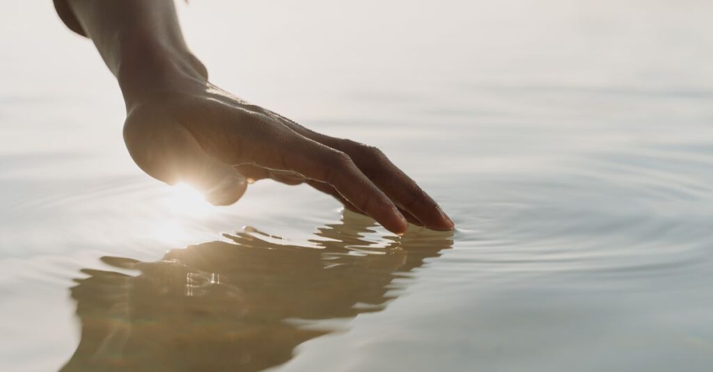 soft hands gentle touch quiet healing light calm body awareness warm atmosphere