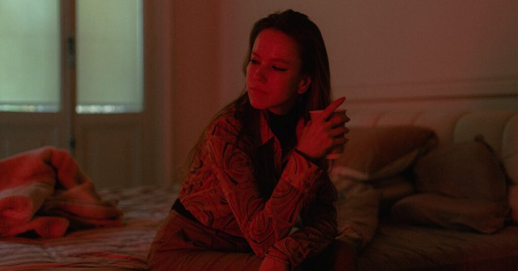 woman alone quiet room soft light holding back asking for help gentle calm