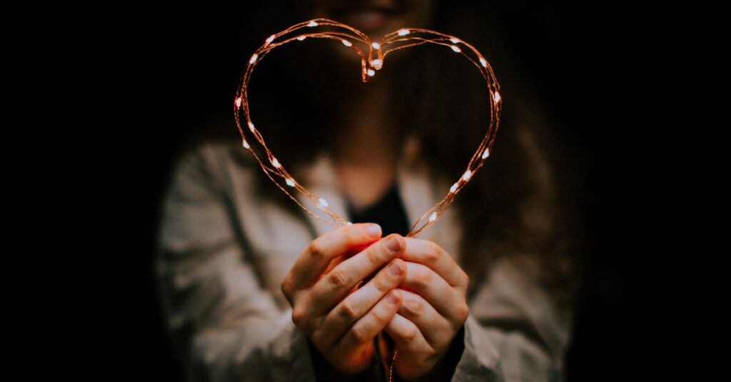 soft warm light gentle self compassion quiet healing hands heart calm atmosphere