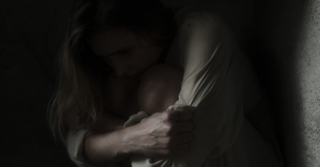 woman alone soft light absorbing emotions quiet sensitive gentle exhausted calm atmosphere