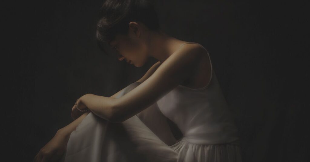 woman alone soft light absorbing emotions quiet sensitive gentle exhausted calm atmosphere