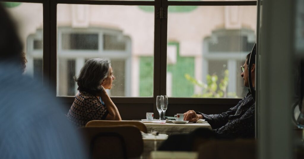 gentle soft light two people quiet conversation calm warm atmosphere