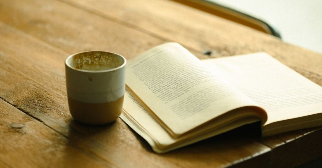 empty cup quiet table soft light exhausted depleted calm gentle atmosphere