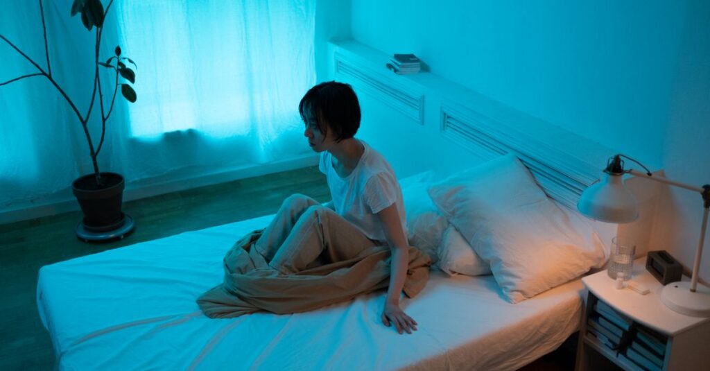 woman alone soft light absorbing emotions quiet sensitive gentle exhausted calm atmosphere