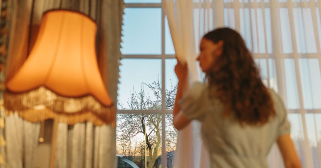 soft window light open curtain quiet emotional release