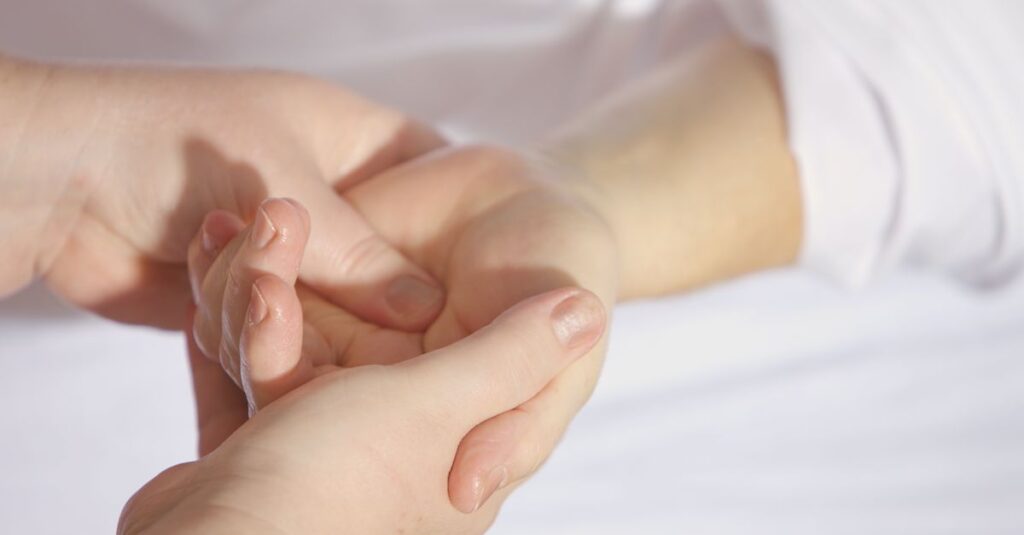 gentle hands near chest soft light self protection calm